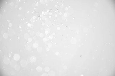 abstract background with white bokeh lights