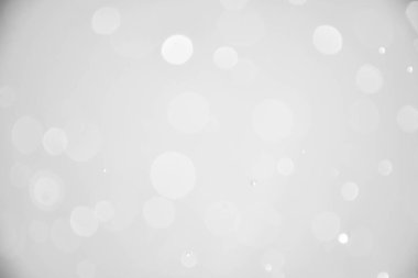 Gümüş Noel arkaplanı Bokeh ve bulanık ışıklarla