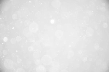 Yılbaşı geçmişi. Gri arka planda beyaz kar taneleri var. vektör illüstrasyonu.