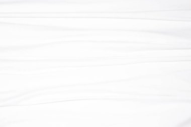 Beyaz ipek arka plan. Yumuşak kıvrımlar ve yumuşak ışık