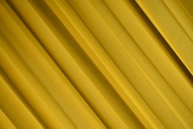 Altın ipek kumaş. Soyut lüks ipek arka plan. altın desen