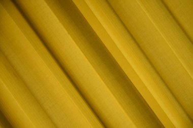 İpek kumaşın dokusu, sarı kumaş.