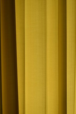 perde dokusu arkaplanı. sarı kumaş arkaplan.