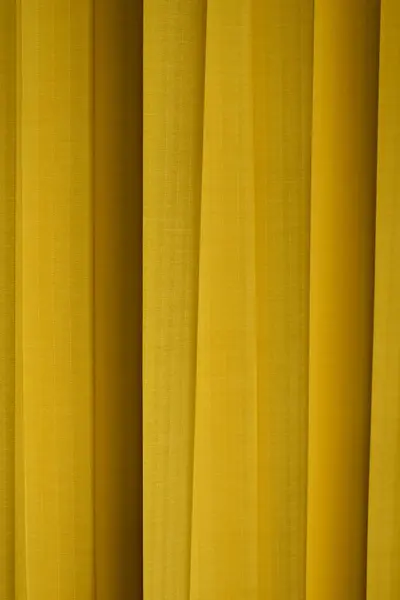 Sarı perde arkaplanı. perde dokusu.