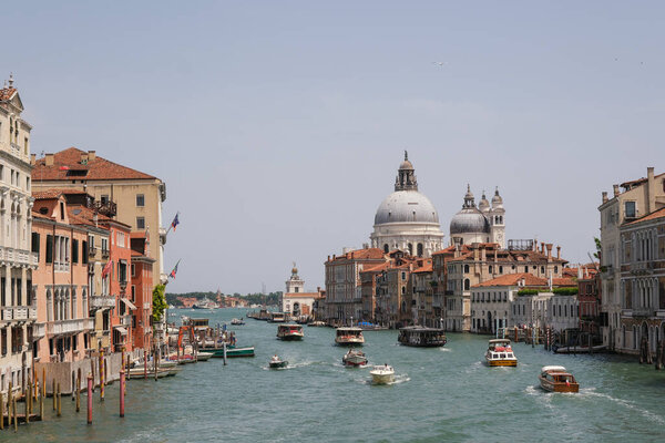 Venice, Italy - June 22, 2023: Stunning view of the Venice Grand Canal and Basilica Santa Maria Della Salute.