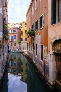 Venice, Italy - June 22, 2023: Canal, bridge and ancient houses of Venice.