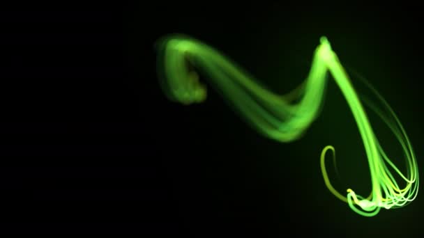 未来的な光ファイバ粒子ライン 黒い背景に流れるか または動く効果抽象ループアニメーション — ストック動画