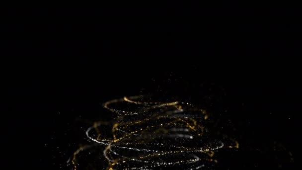 ブラックバックと光と粒子でクリスマスツリーアニメーションを形成する輝くトレイル — ストック動画