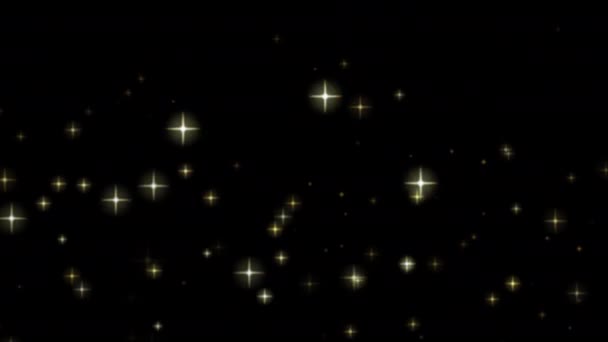 輝く星はアルファ チャンネルが付いている輝く光り輝くちり止めの塵の粒子の魔法のループアニメーション ビデオ — ストック動画