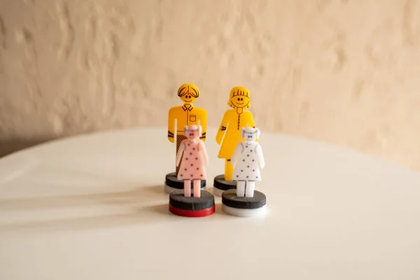 systemic advice, family therapy, concept, psychotherapy acrylic dolls, people, team constellation, posing in selective focus
