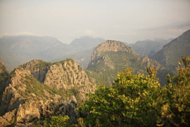 Scenery of the limestone mountain in Kuiburi National Park (Khao Daeng) in Prachuap Khiri Khan Province, Thailand  clipart