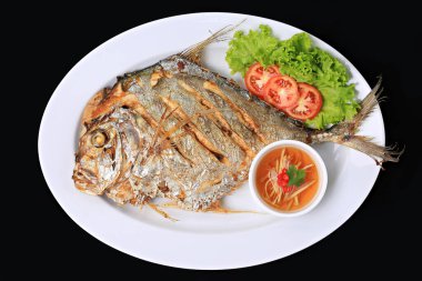 Deep-fried Diamond Trevally with Fish sauce, Food photography for use in menus 