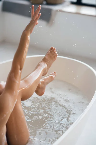 Cropped View Young Woman Lying Foamy Bath Demonstrating Silky Skin — Zdjęcie stockowe