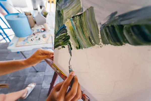 Close Womans Hand Applying Paint Canvas Spatula — Stock Photo, Image