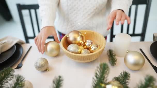 Close Woman Decorating Plate Christmas Balls New Year — Stock Video