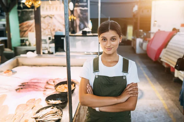 Smiling Female Fishmonger Standing Seafood Shop Counter — Fotografia de Stock