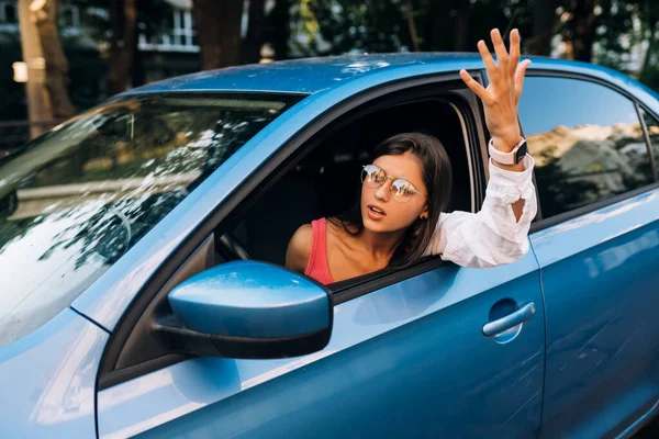 Young Angry Woman Peeks Out Car Window Woman Shows Her — 스톡 사진