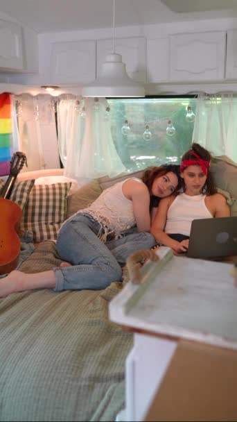 Two Beautiful Hippie Girls Lying Bed Trailer One Them Resting — ストック動画