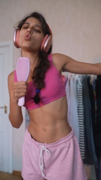 Spirited Young Lady Using Hairbrush Prop Singing Her Heart Out — Stock Video