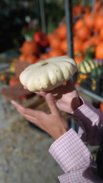 Marketplace Energetic Lady Farmer Demonstrating White Pumpkin Variety Available Purchase — Stock Video