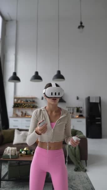 Girl Stylish Athletic Attire Completely Involved Virtual Reality Game Facilitated — Stock Video