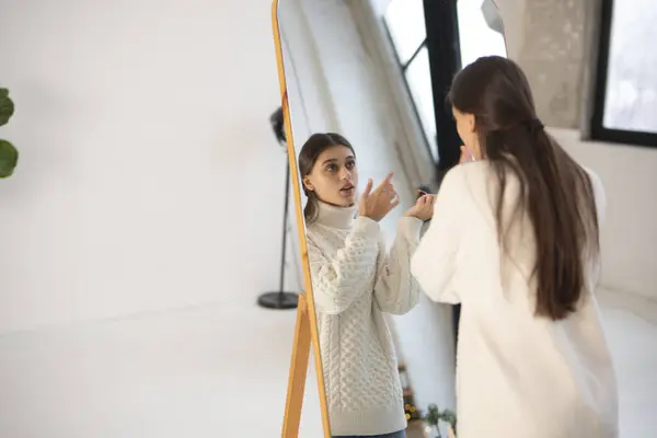 Embracing Christmas Spirit Lovely Young Woman Perfects Her Makeup Mirror — Stock Photo, Image