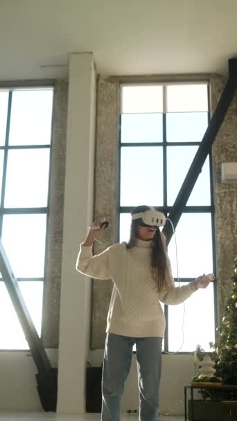 Dynamic Young Woman Utilizes Virtual Reality Headset Play Engaging Online — Stock Video