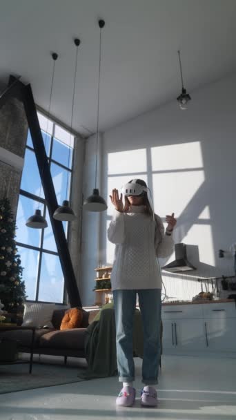 Young Woman Surrounded Christmas Tree Enjoys Virtual Reality Her Apartment — Stock Video