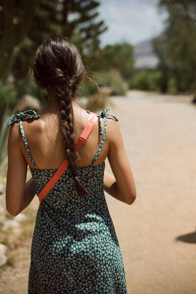 Woman Braided Hair Walks Gracefully Sandy Path Outdoors Wearing Summer Stock Picture
