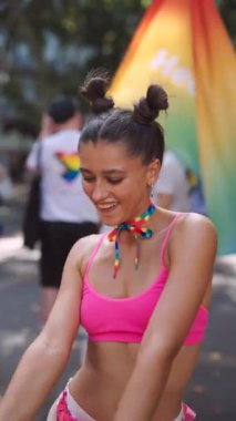 A vibrant celebration of love and diversity unfolds at a colorful Pride parade filled with joy and expression
