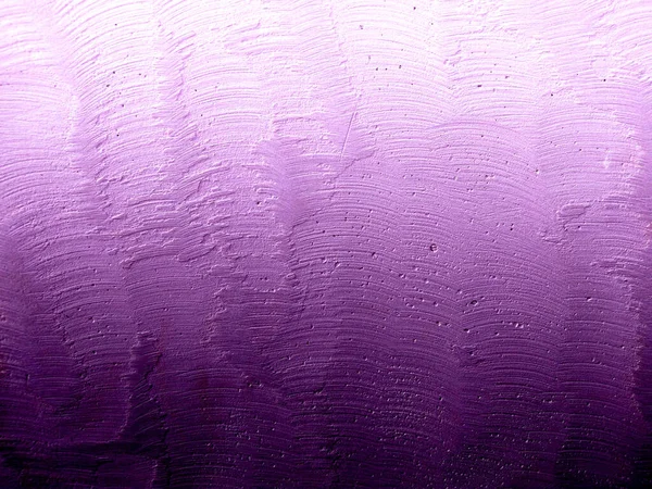 The dark purple gradient rough concrete wall has scratches.  internal structure design pattern