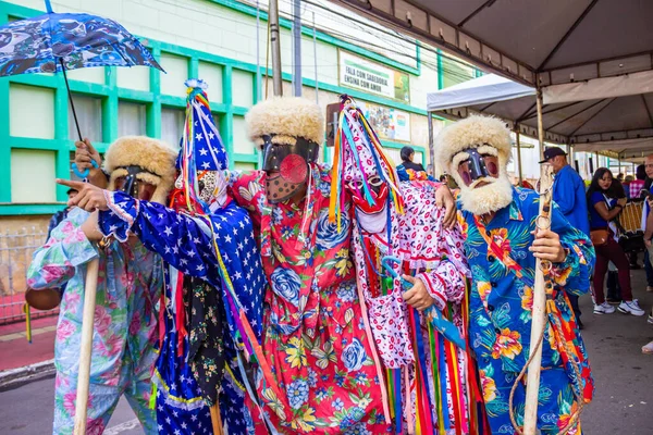 stock image A group of masked people. Typical figures at the Revelry of Kings, a Catholic and folkloric manifestation, which is characterized by celebrating the adoration of the Magi Kings at the birth of Jesus Christ.