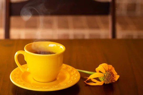 Yellow Cup Filled Hot Steaming Coffee Saucer Wilted Sunflower Wooden — Stock Photo, Image