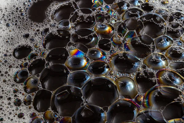 Macro Detalle Burbujas Espuma Jabón Sobre Una Superficie Negra —  Fotos de Stock