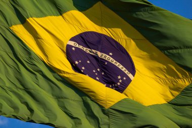 Süper yakın plan Bandeira do Brasil tremulando ao vento.