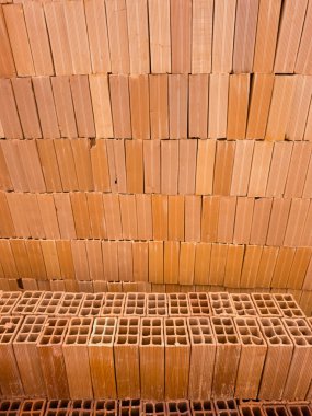 A set of bricks arranged, stacked, for sale. clipart