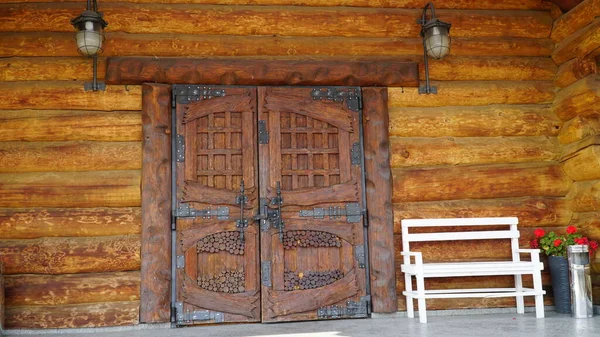 door. Big Double Arch Door. old wooden Front Door of a Traditional European Town House. Old entrance door in a small town.