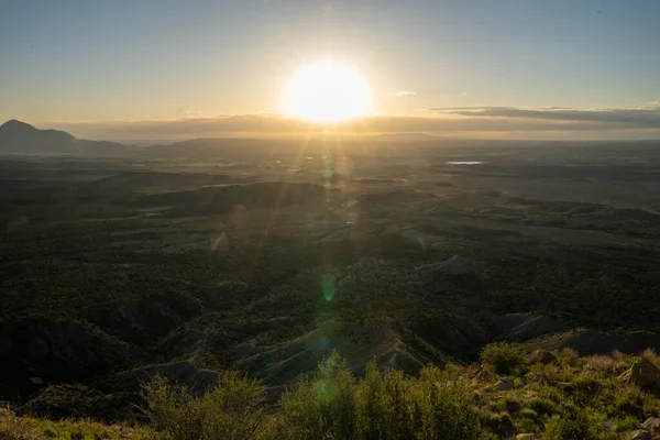 stock image Sun Setting Over Valley Below Mesa Verde National Park