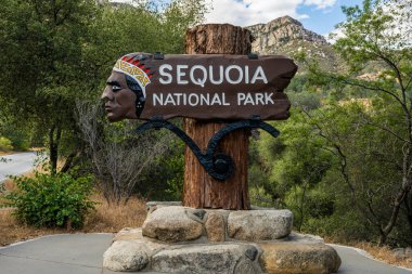 Sequoia National Park, United States: June 12, 2022: Sequoia National Park Sign At The Entrance shows an outdated image of a Native American