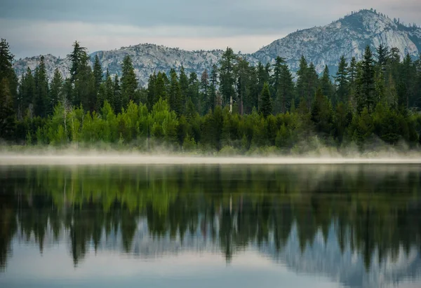 Early Morning Fog Hangs Low Laurel Lake Yosemite Stock Photo