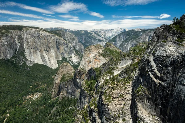 stock image Stanford Point High Above The Valley and Bridalveil Falls Below With El Cap and Half Dome Farther Back