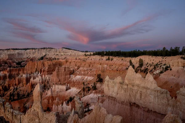 Pink Clouds Form Soaring Bird Shape Bryce Canyon Stock Picture