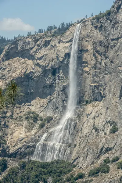 stock image Tueeulala Falls Pours over Cliffs in Yosemite National Park