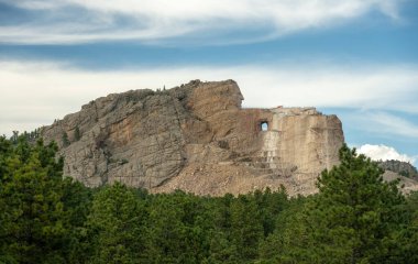 Custer, United States: August 10, 2023: Forest And Rock Outcropping Around The Crazy Horse Statue clipart