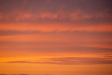 Layers Of Clouds Catch The Fading Sunset Over Pacific Ocean clipart