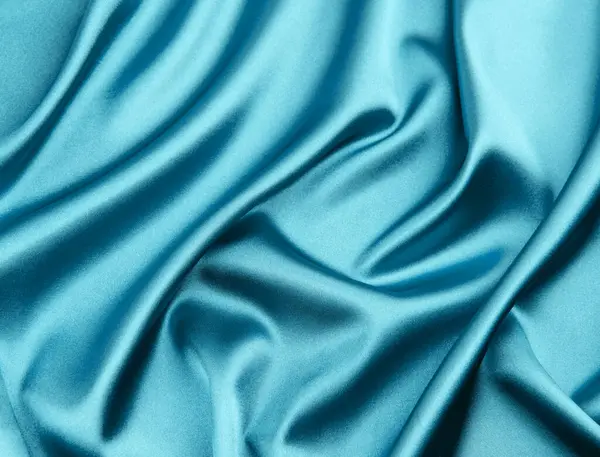 stock image Blue satin or silk fabric as background