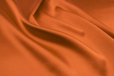 Smooth elegant orange silk can use as background clipart