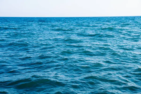 青い海の水の背景の質感 ストックフォト
