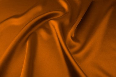 arkaplan olarak kahverengi saten veya ipek kumaş