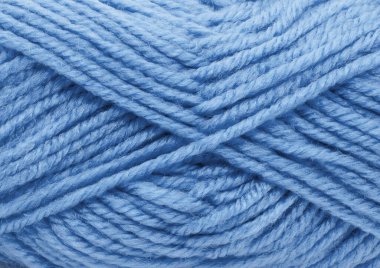 Bulanık bir dokusu olan mavi bir ipliğin yakın çekimi